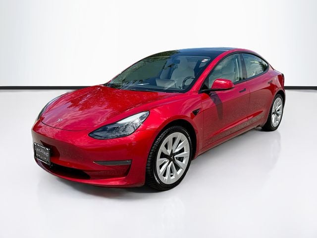 2022 Tesla Model 3 Long Range in Red Multi-Coat — front three-quarter view