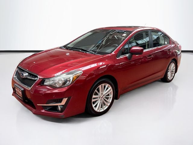 2016 Subaru Impreza 2.0i Premium in Venetian Red Pearl — front three-quarter view