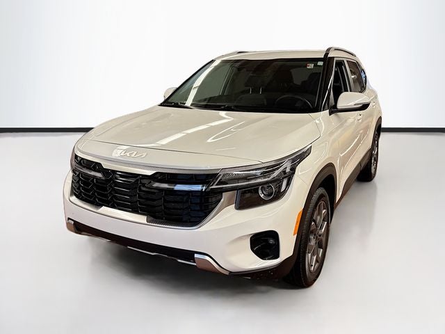 2024 Kia Seltos S in Snow White Pearl — front three-quarter view