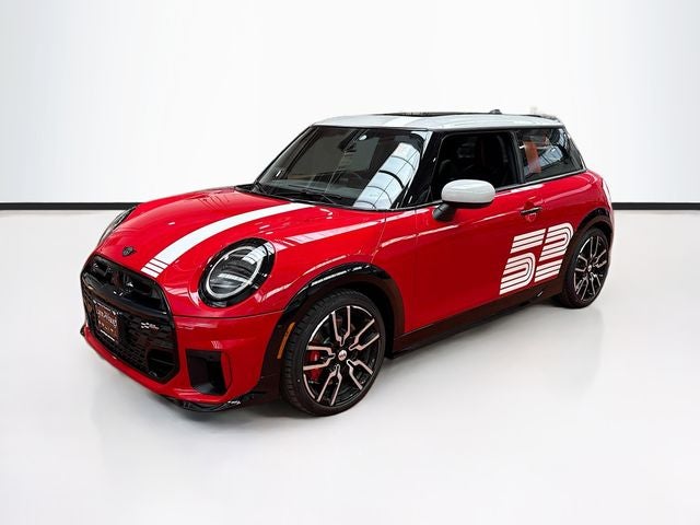 2026 MINI 2 DOOR ICONIC in Chili Red II — front three-quarter view