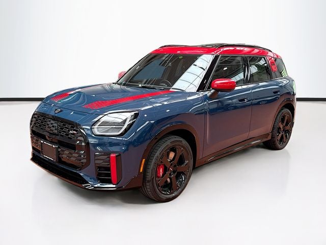 2027 MINI COUNTRYMAN ICONIC in Indigo Sunset Blue Metallic — front three-quarter view