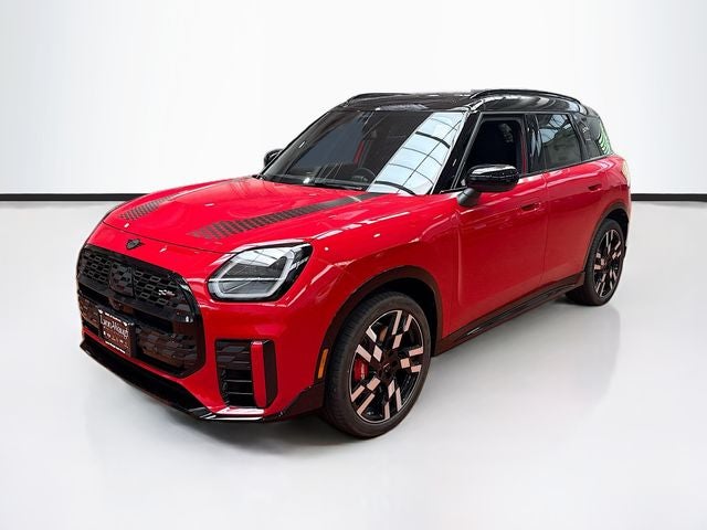 2027 MINI COUNTRYMAN ICONIC in Chili Red II — front three-quarter view