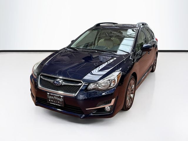 2015 Subaru Impreza 2.0i Sport Limited in Deep Sea Blue Pearl — front three-quarter view