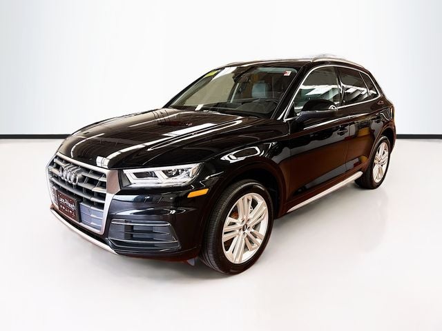 2020 Audi Q5 45 Premium Plus quattro in Black Metallic — front three-quarter view